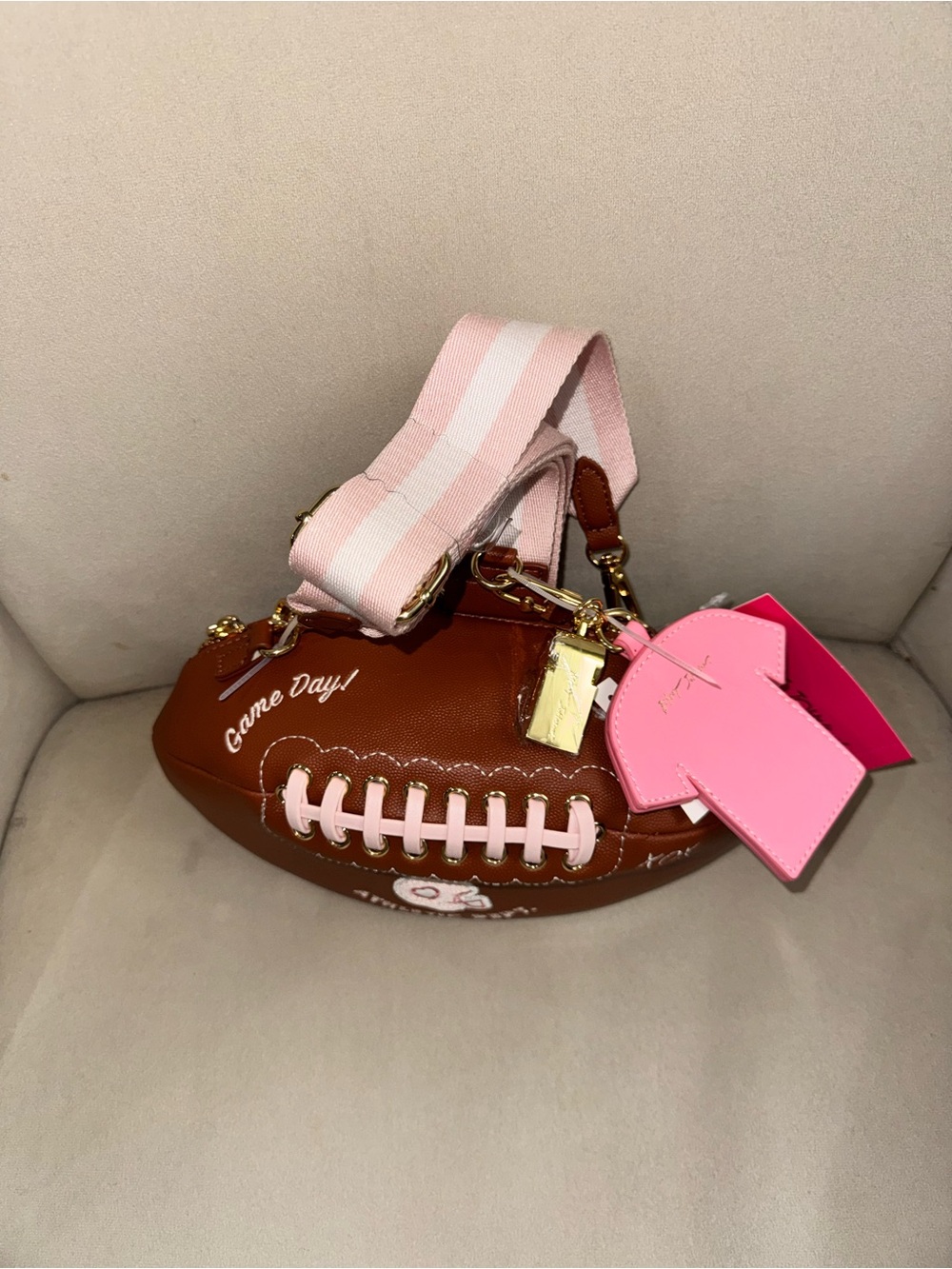 Betsey Johnson Brown & Pink Football Crossbody Bag with Striped Strap